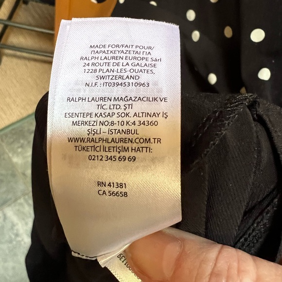 Never worn Navy and white polka dot dress
Size 12 - Picture 5 of 6